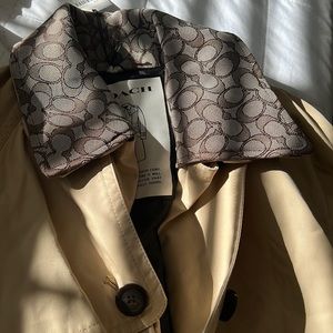 New Coach men trench coat.